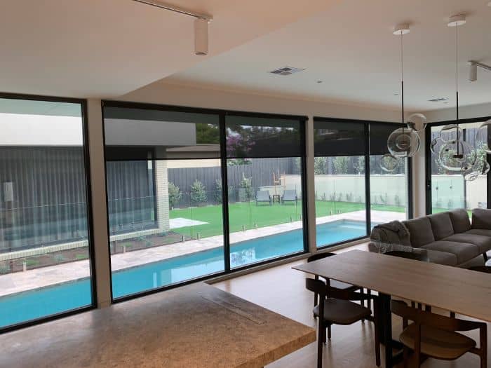 Automated blinds overlooking pool in Melbourne luxury homee